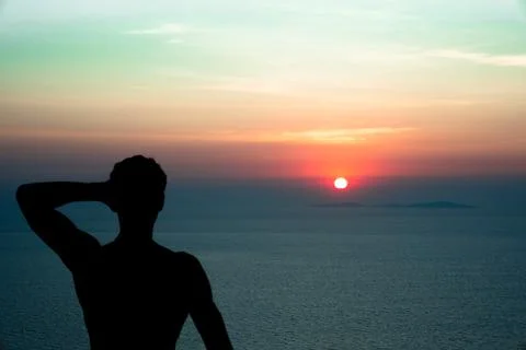 Sunset background with a guy in the left corner Stock Photos