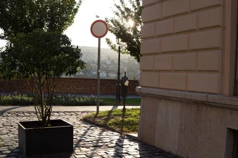 Sunset on a background of a hill in the old town Stock Photos
