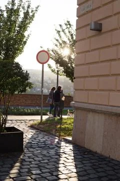 Sunset on a background of a hill in the old town Stock Photos