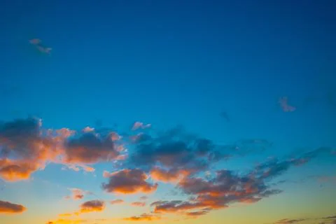 Sunset background. Orange clouds and sunset sky. Stock Photos