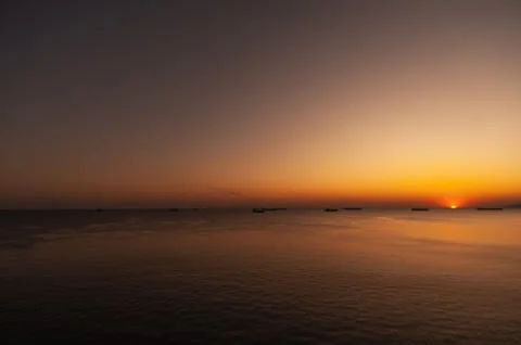 A sunset in the background Stock Photos