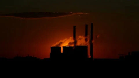 Sunset on the background of power with the trumpets Stock Footage 8558407