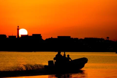 Sunset background in river with the mosque in th shadow. 스톡 사진