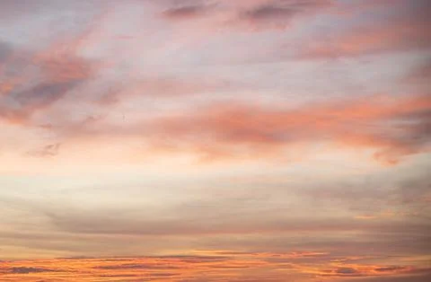 Sunset background sky with soft and blur pastel colour in pink and orange ton Stock Photos
