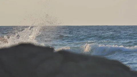 Sunset background at tropical beach with sea waves in slow motion Stock Footage 86294975
