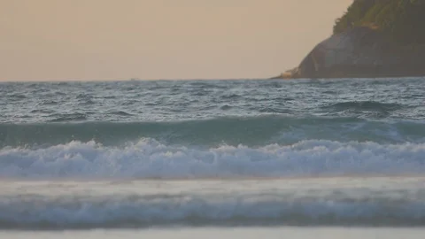 Sunset background at tropical beach with sea waves in slow motion Video stock 86294986