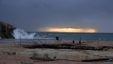 Sunset in a bad weather behind a destroyed mole Stock Footage 108634413