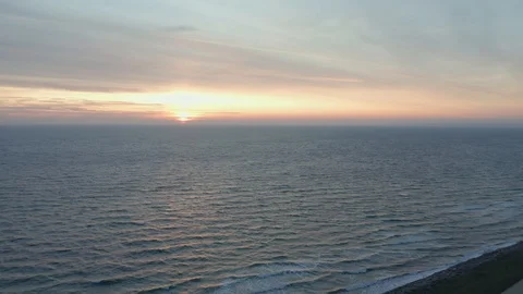 Sunset at baltic sea in Germany from drone aerial view Stock Footage 119465508