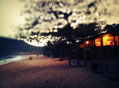 Sunset, a bar on the beach Stock Photos