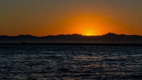 From sunset to the Bay bridge pan across San Francisco bay Stock-Footage 80622090