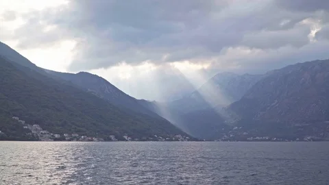 Sunset on the Bay of Kotor. Light through the clouds Stock Footage 121991072
