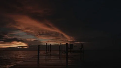 Sunset on Bay with Pier Stock Footage 82976895