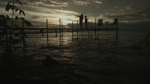 Sunset on Bay with Pier wide Stock Footage 82976455