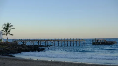 Sunset Beach and Broken Pier  Time-Lapse Stock Footage 101748458