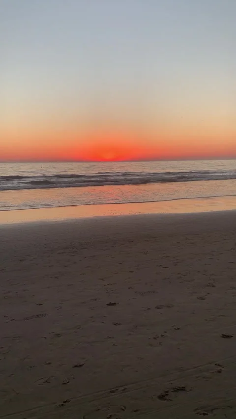Sunset Beach and City HD Stock Footage 175464302