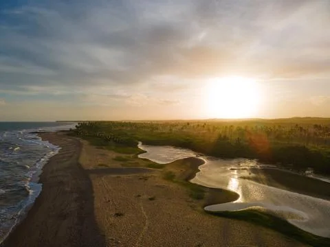 Sunset on the beach and river Foto stock
