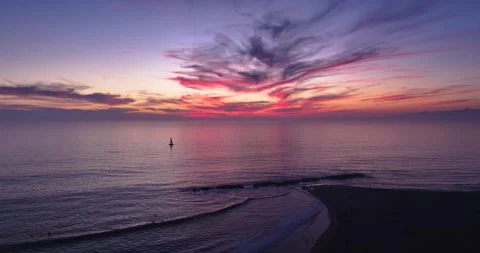 Sunset with beach and surfers Video stock 291713641