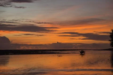 Sunset on the beach of andaman sea Stock Photos