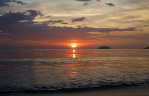 Sunset with beach background Stock Photos