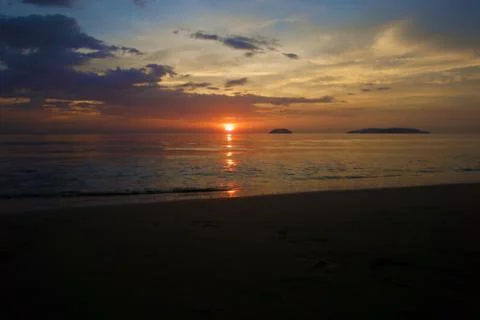 Sunset with beach background Stock Photos