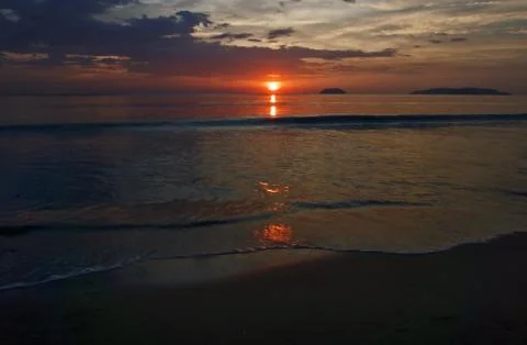 Sunset with beach background Stock Photos