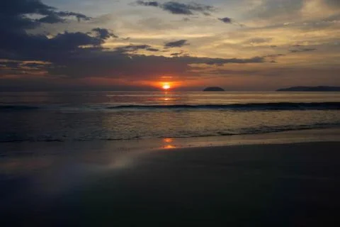 Sunset with beach background Stock Photos