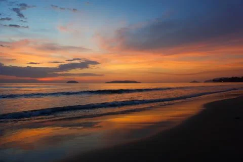Sunset with beach background Stock Photos
