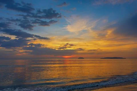 Sunset with beach background Stock Photos