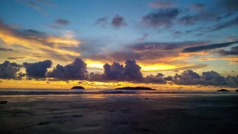 Sunset with beach background Stock Photos