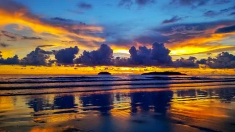 Sunset with beach background Stock Photos