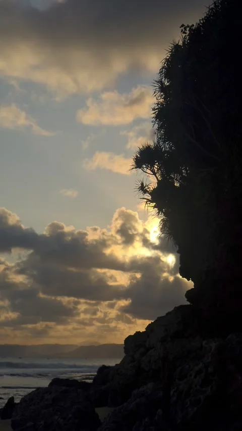 Sunset on the beach with beautiful sky in portrait video Stock Footage 288061141
