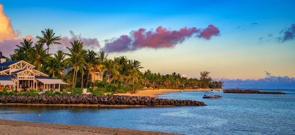 Sunset Beach in Bel Ombre, Mauritius Under a Colorful Sky Stock Photos