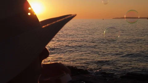 Sunset beach bubbles Slomo OTS 4K UHD Stock Footage 128303723