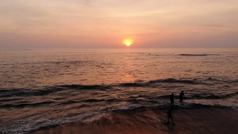 Sunset on the beach of Canggu Stock Footage 124758828