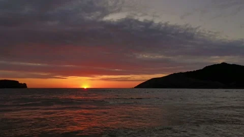 Sunset on the beach with clouds Stock Footage 135315448
