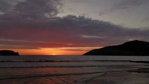 Sunset on the beach with clouds Stock Footage 135315506