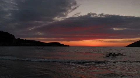 Sunset on the beach with clouds Stock Footage 135315627