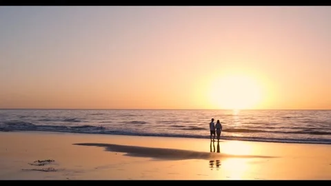 Sunset beach couple ocean Video stock 273698042