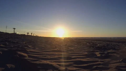 Sunset At The Beach Couple Walk Into It Vídeo Stock 99493244