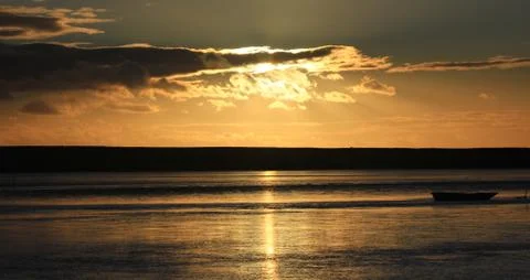 Sunset beach dorset Stock Photos