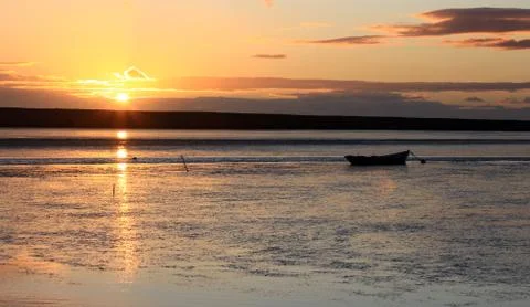 Sunset beach dorset Stock Photos