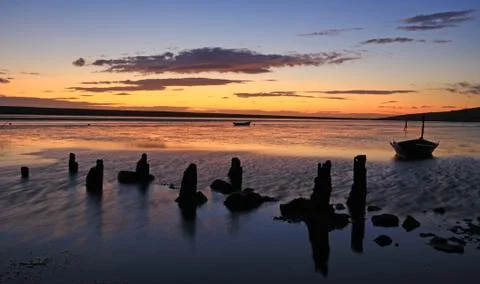 Sunset beach dorset Stock Photos