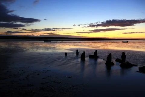 Sunset beach dorset Stock Photos