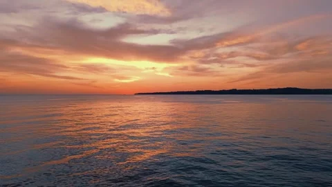 Sunset on the beach with dramatic cloudy sky. Stock Footage 297035013