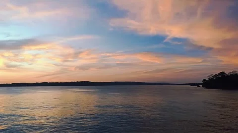 Sunset on the beach with dramatic cloudy sky. Stock Footage 297035082