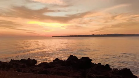Sunset on the beach with dramatic cloudy sky. Stock Footage 297035383