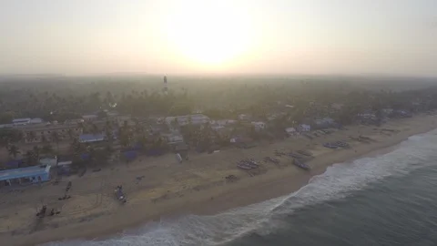 Sunset by the beach drone over light house 스톡 동영상 86490900