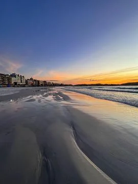 Sunset Beach at Dusk Stock Photos