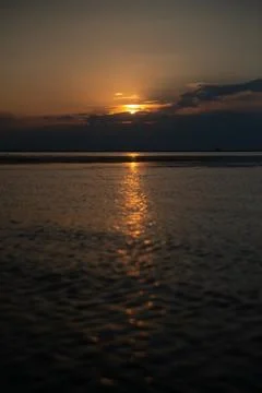 Sunset on the beach in the evening. Foto stock