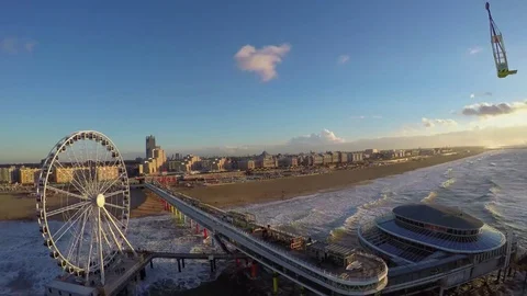 Sunset Beach Ferris Wheel Scheveningen 4K Stock Footage 76749110